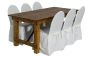 Platzsparender Tisch Industrial 180x90cm in Echtholz am Bild mit den Polsterstühlen mit Husse in weiß (separat bestellen)